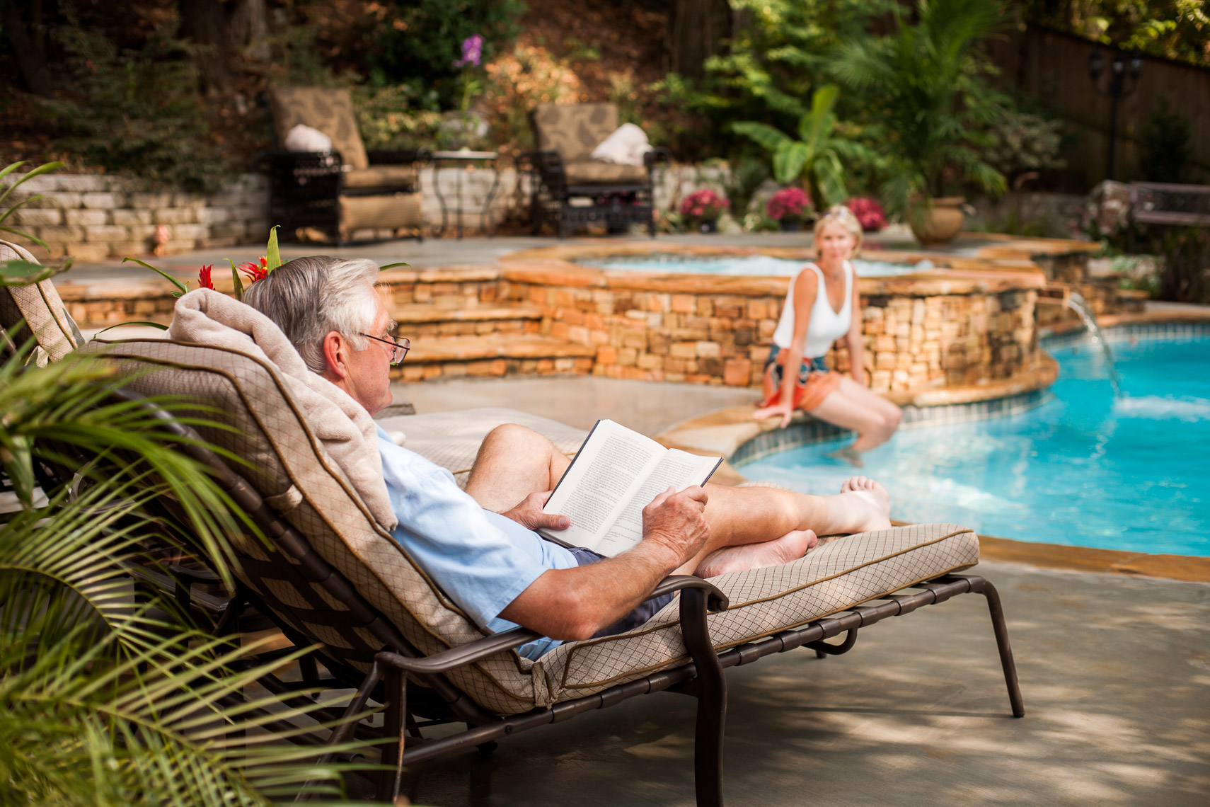 Lifestyle Photo of Older Couple at Pool
