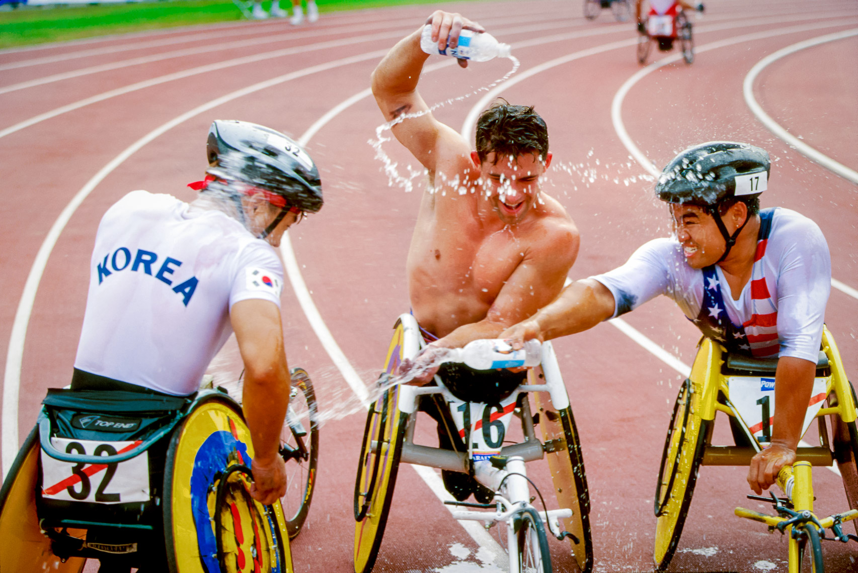 Wheelchair Racers Celebrate After the Marathon